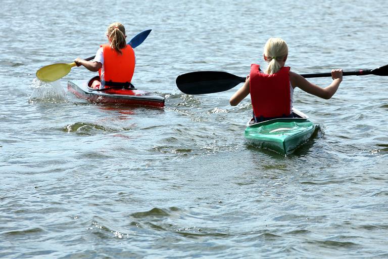Two kids kayaking